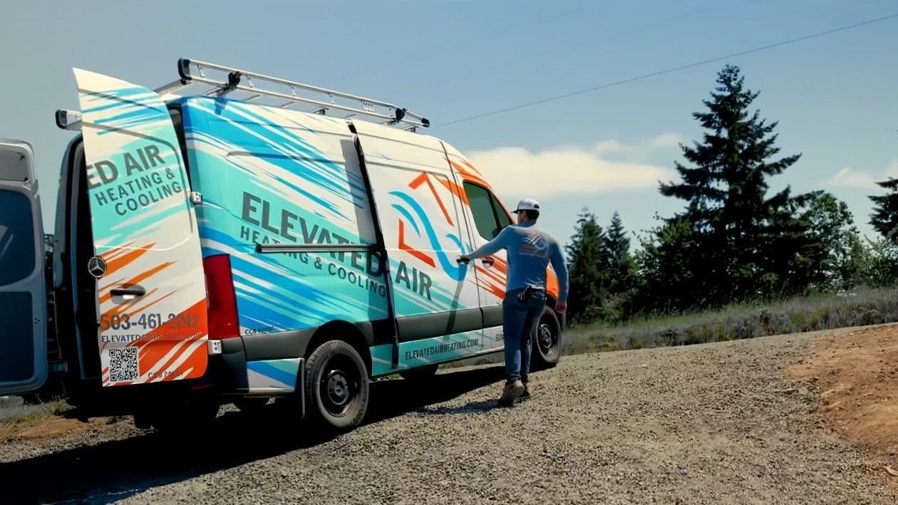 Elevated Air Heating and Cooling - HVAC Installation in Salem, OR HVAC contractor installing outdoor AC condenser unit in Salem Oregon